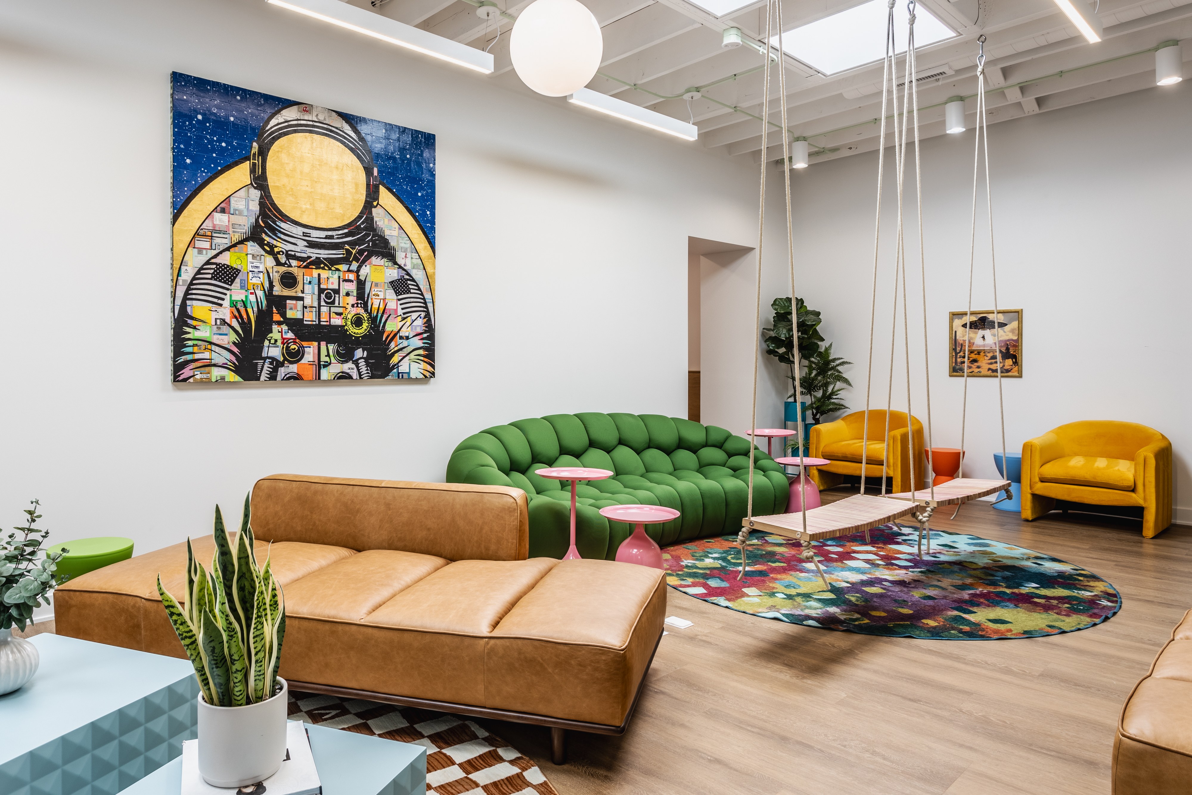 Vibrant Modern office collaboration lounge with colorful furnishings built by Boaz Construction